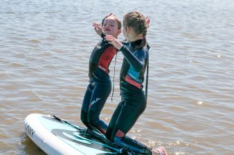 teach kids to stand up paddle board